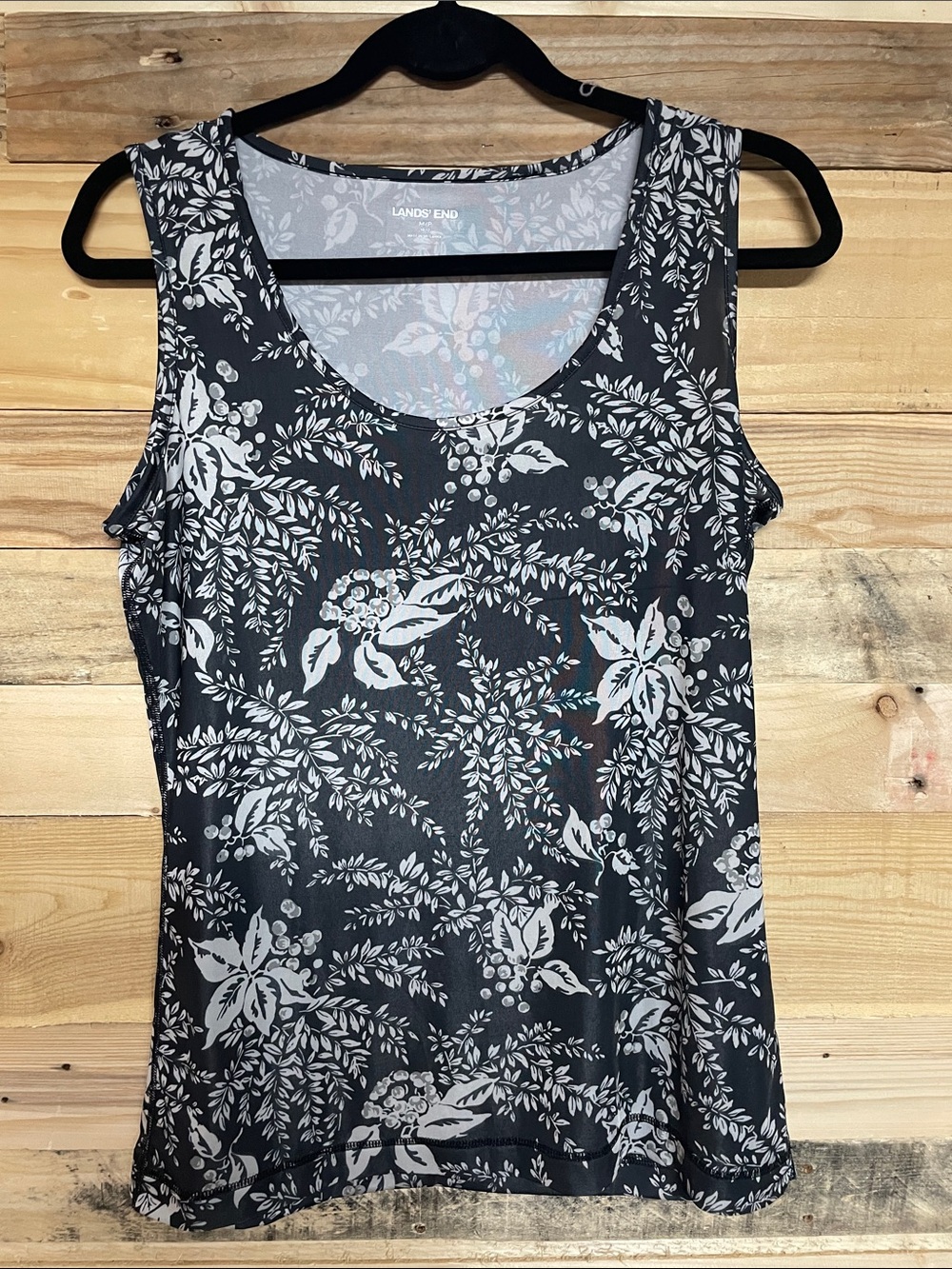 Lands’ End size medium petite black with gray floral slinky sleeveless blouse